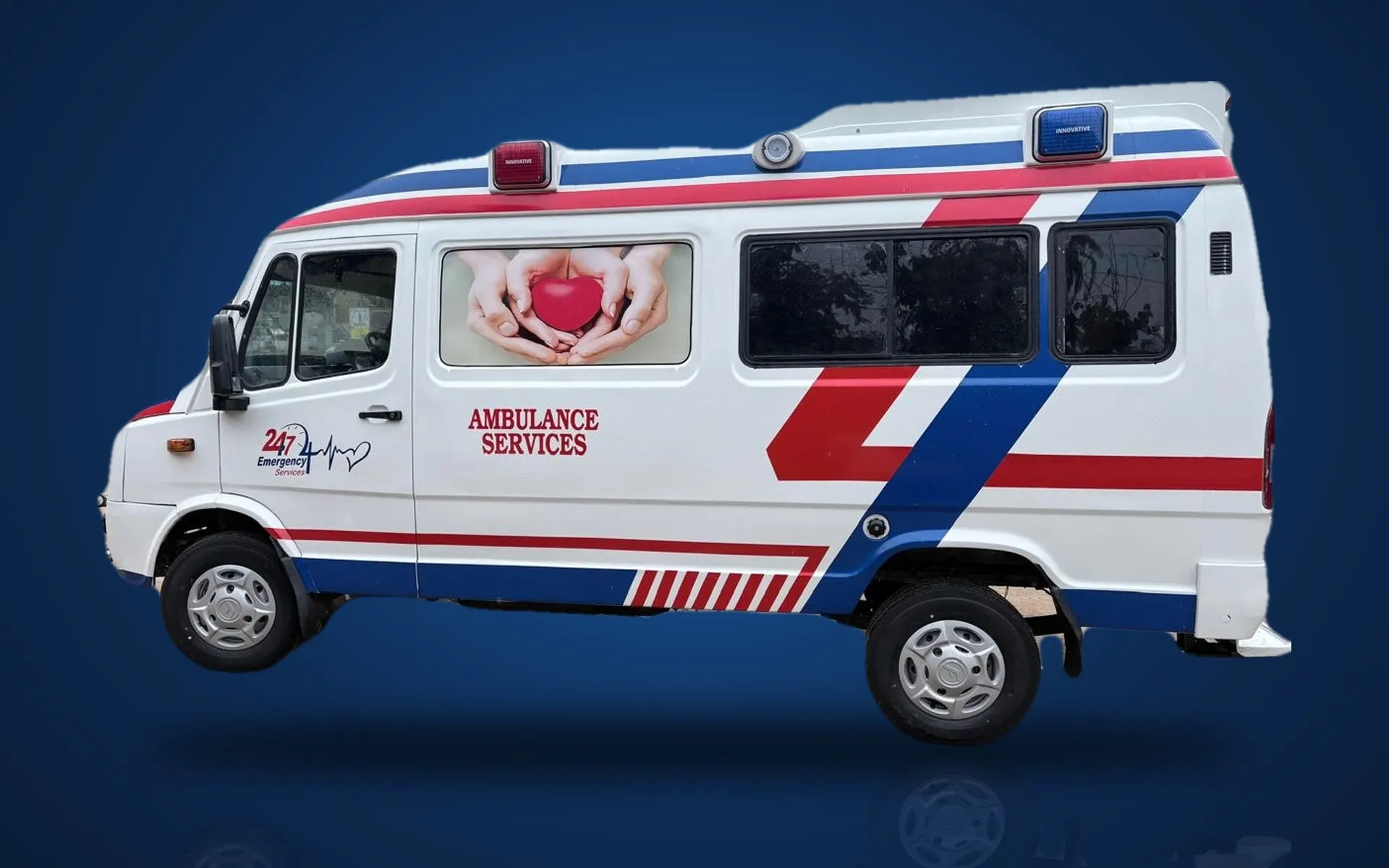 Sri Loukya Ambulance Service ambulance van, left side, in white with red and blue livery